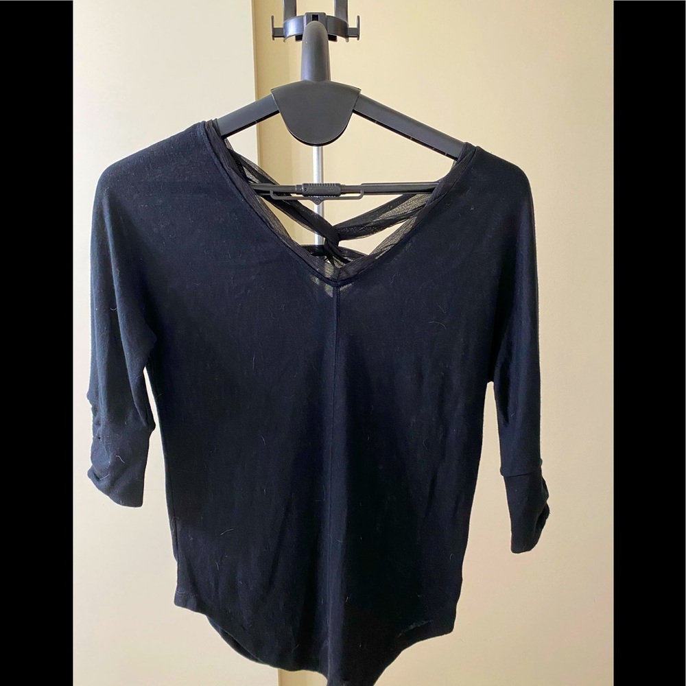 Deletta black top with back detail.  Anthropologie.  New with tags